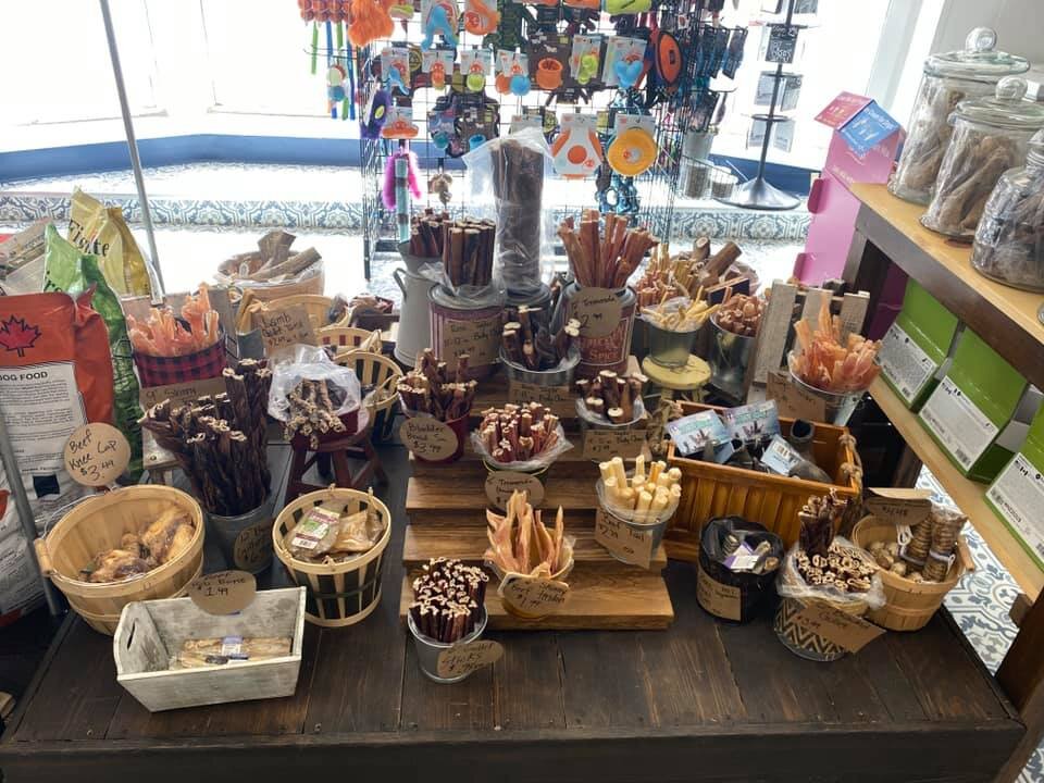 A large display of freeze dried and raw treats sits on a table at the Utah Freeze Dried for Pets store in Sandy, Utah